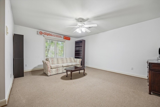 5135 Edloe St, Houston, TX 77005 - carpeted living area with ceiling fan and baseboards