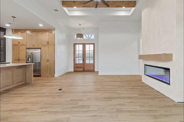 16685 Kelton, Iola, TX 77861 - kitchen featuring built in fridge, a raised ceiling, a ceiling fan, light wood-type flooring, and recessed lighting