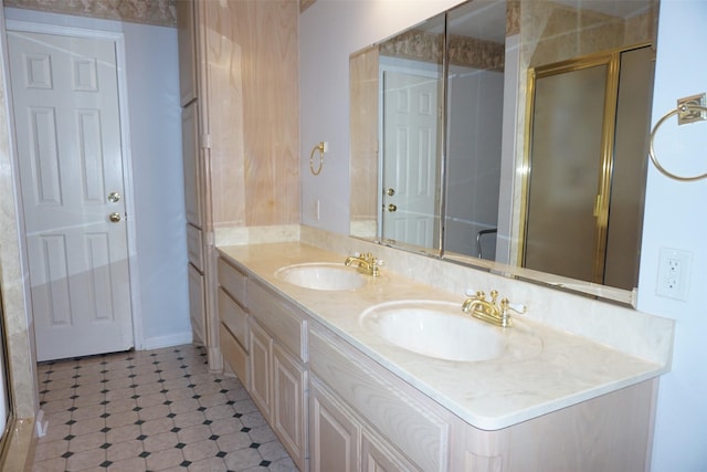 19710 Lowe St, Porter, TX 77365 - bathroom featuring a shower stall, double vanity, and baseboards