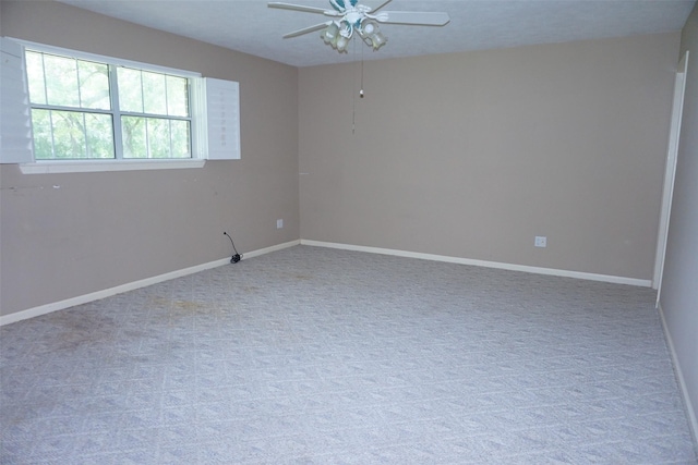 19710 Lowe St, Porter, TX 77365 - carpeted spare room featuring ceiling fan and baseboards