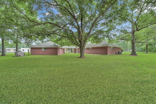 19710 Lowe St, Porter, TX 77365 - view of green lawn