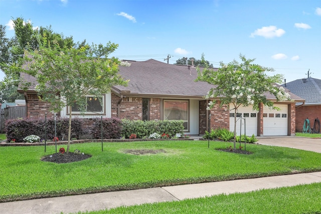 1109 Alan St, Deer Park, TX 77536 - view of front of property with brick siding, a garage, and a shingled roof