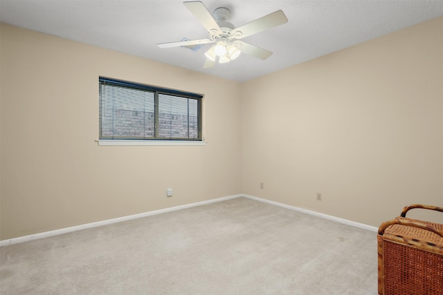 1109 Alan St, Deer Park, TX 77536 - spare room with light colored carpet, baseboards, and ceiling fan