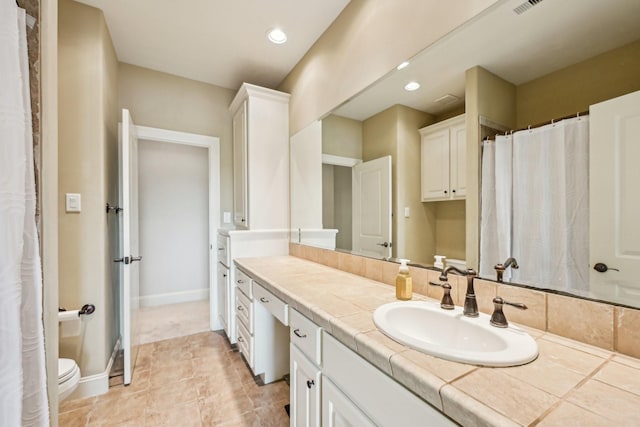 24807 Thorton Knolls Dr, Spring, TX 77389 - bathroom featuring vanity, toilet, recessed lighting, a shower with curtain, and baseboards