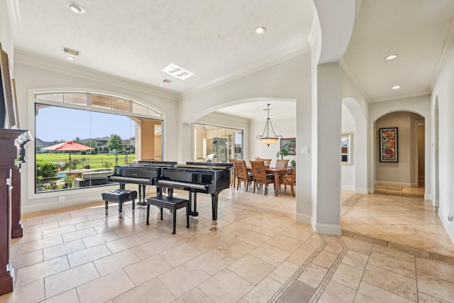 24807 Thorton Knolls Dr, Spring, TX 77389 - dining space featuring plenty of natural light, recessed lighting, ornamental molding, arched walkways, and baseboards
