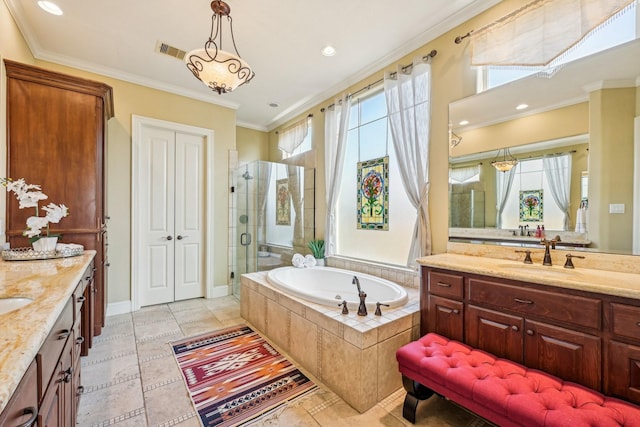24807 Thorton Knolls Dr, Spring, TX 77389 - bathroom with two vanities, a shower stall, a bath, ornamental molding, and recessed lighting