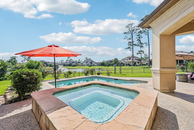 24807 Thorton Knolls Dr, Spring, TX 77389 - view of swimming pool featuring an in-ground hot tub and a residential view