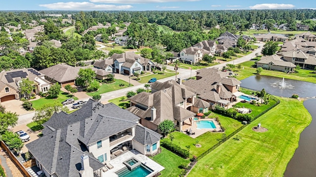 24807 Thorton Knolls Dr, Spring, TX 77389 - aerial view of residential area with a pool area and a nearby body of water