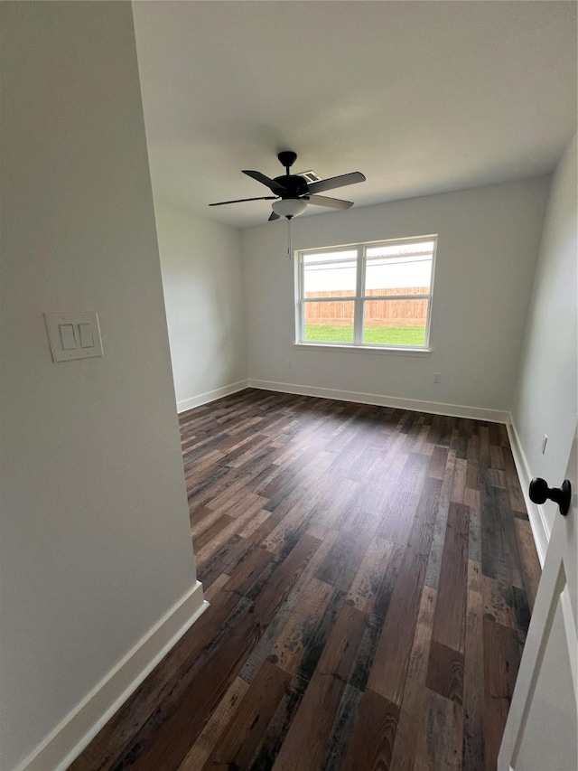 1618 Del Norte St, Houston, TX 77018 - unfurnished room with dark wood finished floors, a ceiling fan, and baseboards