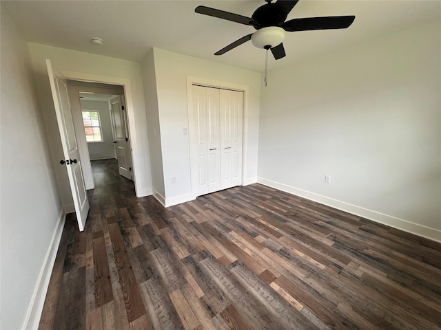 1618 Del Norte St, Houston, TX 77018 - unfurnished bedroom featuring dark wood finished floors, baseboards, a closet, and ceiling fan