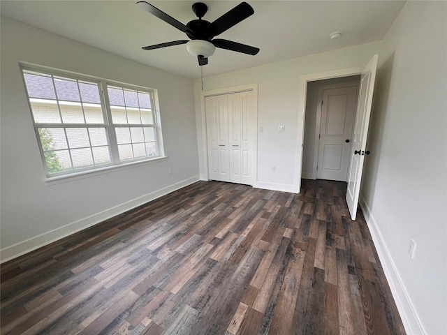 1618 Del Norte St, Houston, TX 77018 - unfurnished bedroom featuring dark wood finished floors, a closet, and baseboards