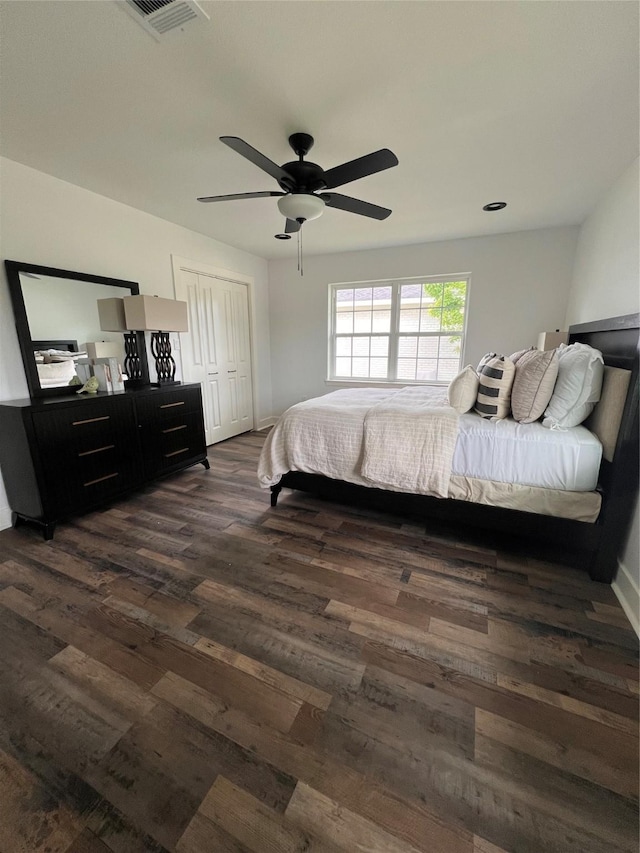 1618 Del Norte St, Houston, TX 77018 - bedroom featuring dark wood finished floors, baseboards, a ceiling fan, and a closet
