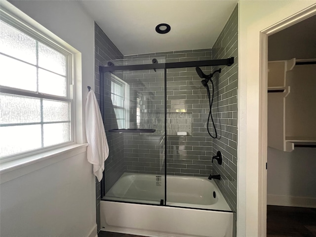 1618 Del Norte St, Houston, TX 77018 - bathroom featuring baseboards and bath / shower combo with glass door