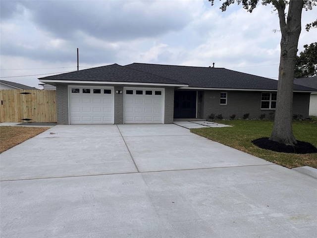 1618 Del Norte St, Houston, TX 77018 - ranch-style house featuring brick siding, an attached garage, driveway, and roof with shingles