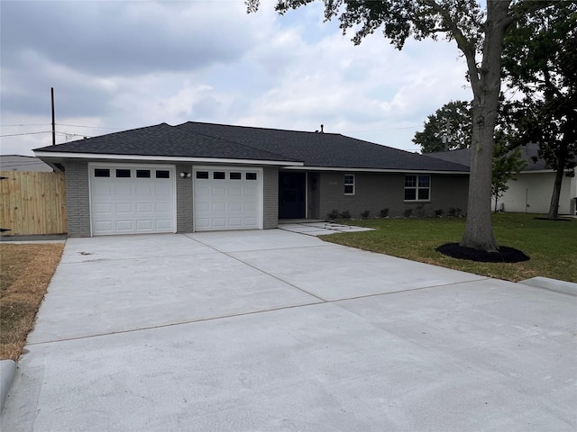 1618 Del Norte St, Houston, TX 77018 - ranch-style home featuring brick siding, a garage, and driveway