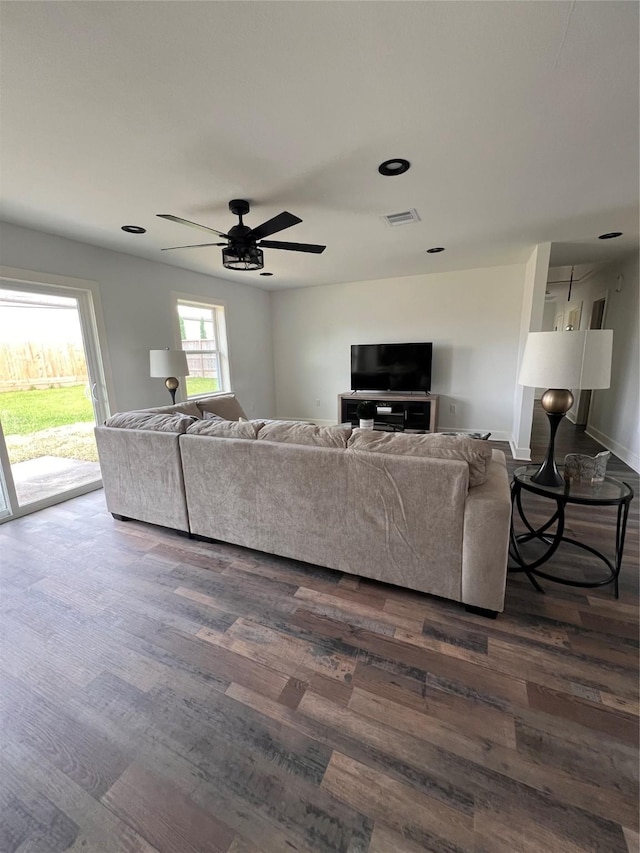 1618 Del Norte St, Houston, TX 77018 - living area featuring dark wood finished floors and ceiling fan