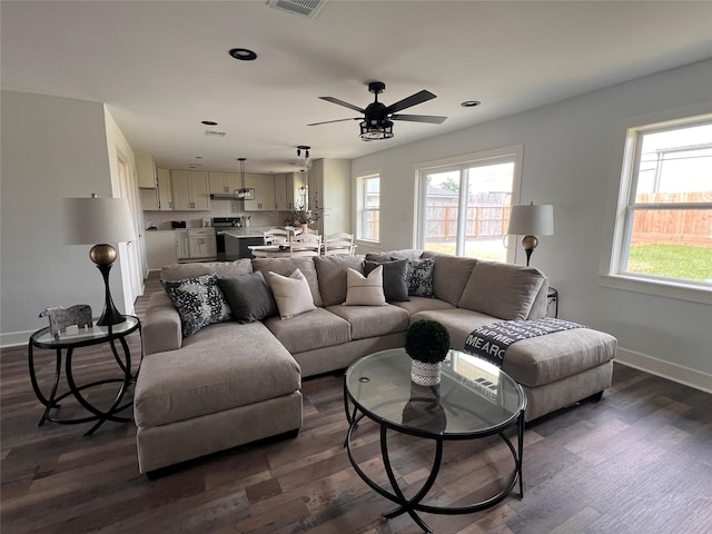 1618 Del Norte St, Houston, TX 77018 - living area with healthy amount of natural light, dark wood-style flooring, a ceiling fan, baseboards, and recessed lighting