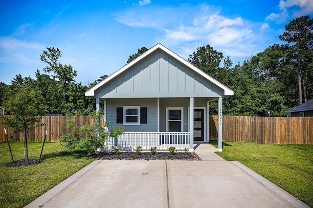 17070 Marie Village Dr, Conroe, TX 77306 - bungalow with board and batten siding and covered porch