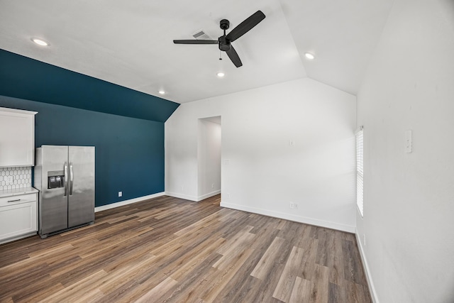 17070 Marie Village Dr, Conroe, TX 77306 - additional living space featuring vaulted ceiling, a ceiling fan, wood finished floors, baseboards, and recessed lighting