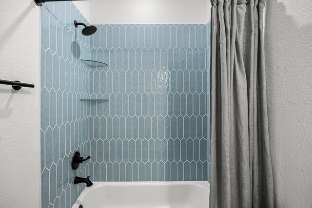 17070 Marie Village Dr, Conroe, TX 77306 - full bath featuring shower / bathtub combination with curtain