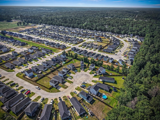 17070 Marie Village Dr, Conroe, TX 77306 - aerial view of property's location featuring a heavily wooded area and nearby suburban area