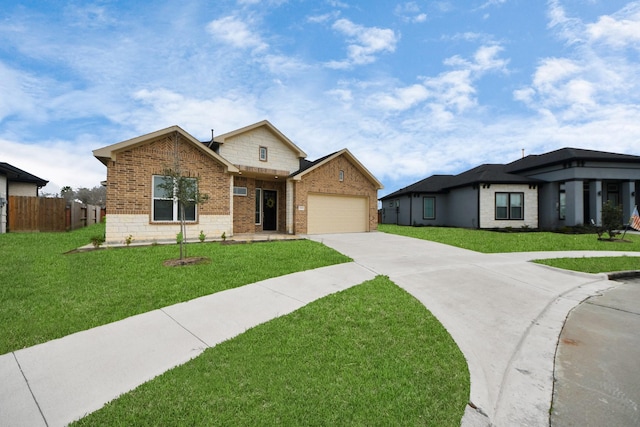 2003 Marthoman Dr, Missouri City, TX 77489 - view of front of home with driveway, brick siding, and a garage