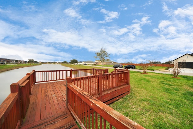 2003 Marthoman Dr, Missouri City, TX 77489 - deck featuring a yard, a water view, and a residential view
