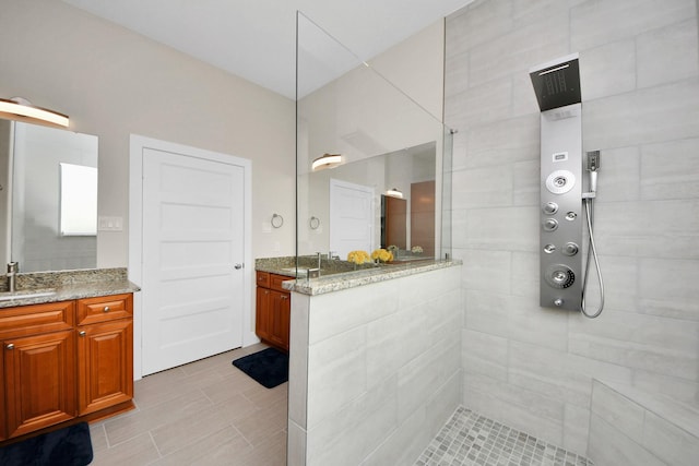 2003 Marthoman Dr, Missouri City, TX 77489 - bathroom with a tile shower and vanity
