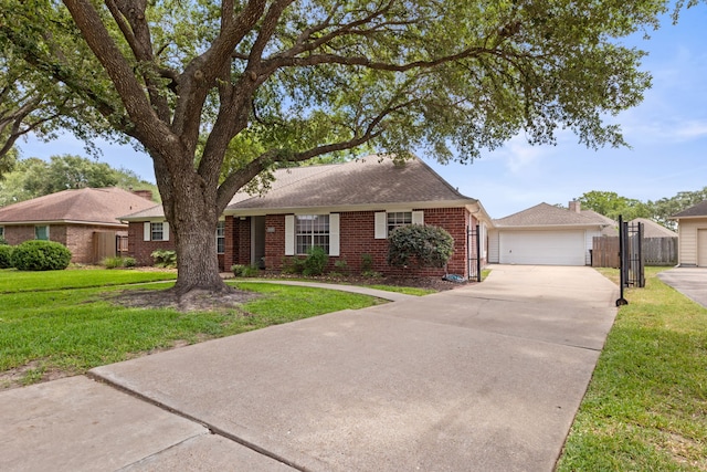 6509 Patricia St, Katy, TX 77493 - ranch-style house featuring brick siding, a garage, roof with shingles, and concrete driveway
