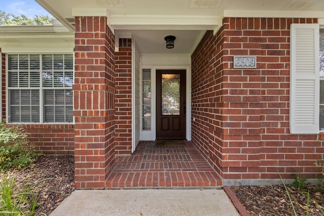 6509 Patricia St, Katy, TX 77493 - doorway to property featuring brick siding