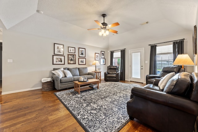 6509 Patricia St, Katy, TX 77493 - living area featuring lofted ceiling, a ceiling fan, wood finished floors, and baseboards