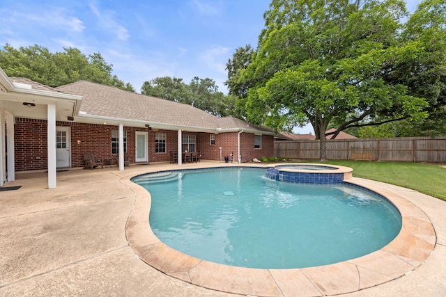 6509 Patricia St, Katy, TX 77493 - view of swimming pool featuring a fenced backyard, a patio area, and a pool with connected hot tub