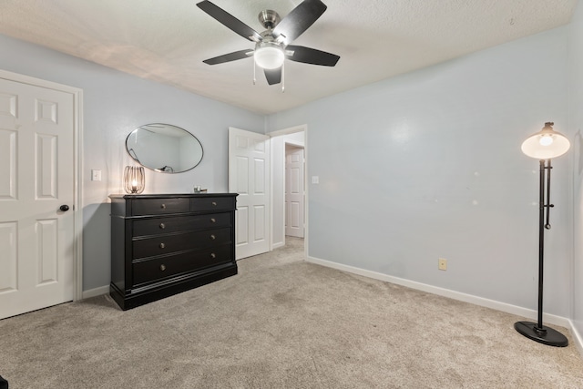 6509 Patricia St, Katy, TX 77493 - unfurnished bedroom with carpet floors, baseboards, and ceiling fan