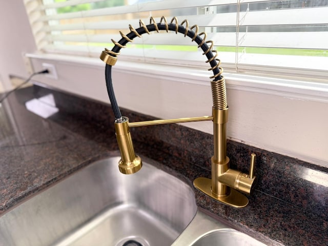 3403 Fox Ct, Pearland, TX 77581 - kitchen view of tasteful backsplash and a sink