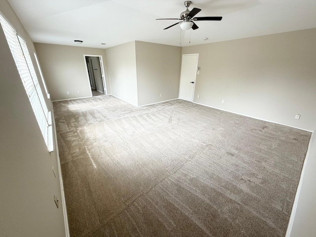 3403 Fox Ct, Pearland, TX 77581 - spare room with ceiling fan, baseboards, and light colored carpet