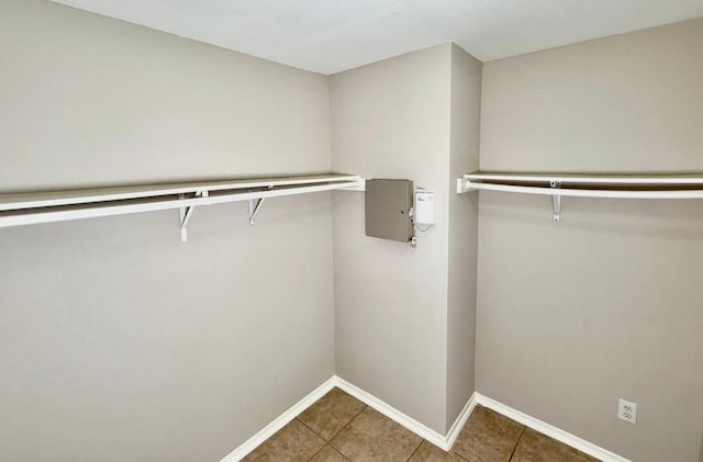 3403 Fox Ct, Pearland, TX 77581 - spacious closet featuring tile patterned floors