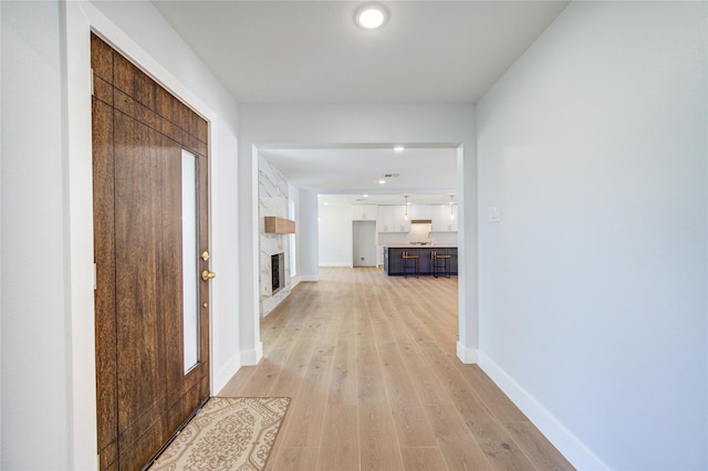 1810 Eagle Falls Ct, Houston, TX 77077 - corridor with light wood-style floors and baseboards