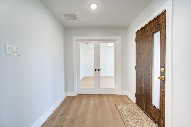 1810 Eagle Falls Ct, Houston, TX 77077 - entrance foyer with french doors, light wood-type flooring, baseboards, and recessed lighting