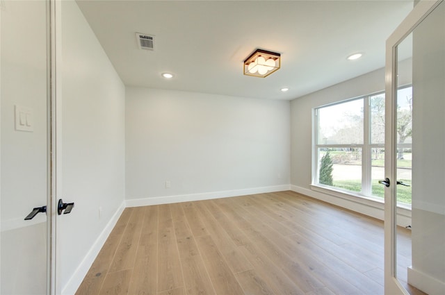 1810 Eagle Falls Ct, Houston, TX 77077 - spare room featuring healthy amount of natural light, light wood-style floors, recessed lighting, and baseboards