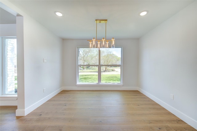 1810 Eagle Falls Ct, Houston, TX 77077 - unfurnished room featuring plenty of natural light, baseboards, recessed lighting, and light wood-style floors