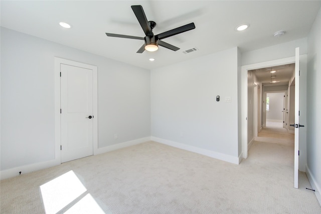 1810 Eagle Falls Ct, Houston, TX 77077 - spare room featuring light colored carpet, a ceiling fan, recessed lighting, and baseboards