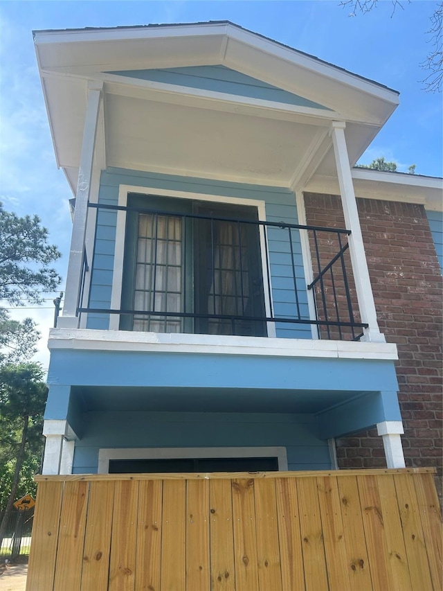 7402 Alabonson Rd Unit 202, Houston, TX 77088 - view of side of home with a balcony