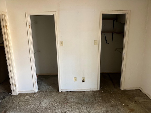 7402 Alabonson Rd Unit 202, Houston, TX 77088 - unfurnished bedroom with a spacious closet, a closet, and carpet flooring