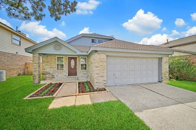 1223 Berrystone Trl, Missouri City, TX 77459 - view of front of home with a front yard, an attached garage, driveway, brick siding, and central air condition unit