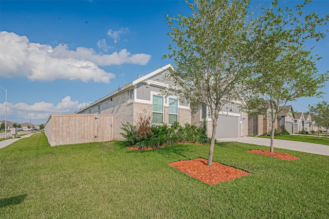 4507 Mustang Run Dr, Rosenberg, TX 77469 - view of front of property with driveway, brick siding, a front yard, and a residential view