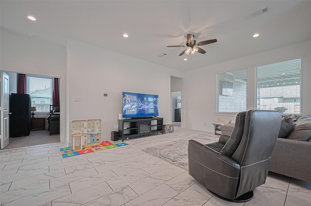 4507 Mustang Run Dr, Rosenberg, TX 77469 - living area with light marble finish flooring, ceiling fan, and recessed lighting