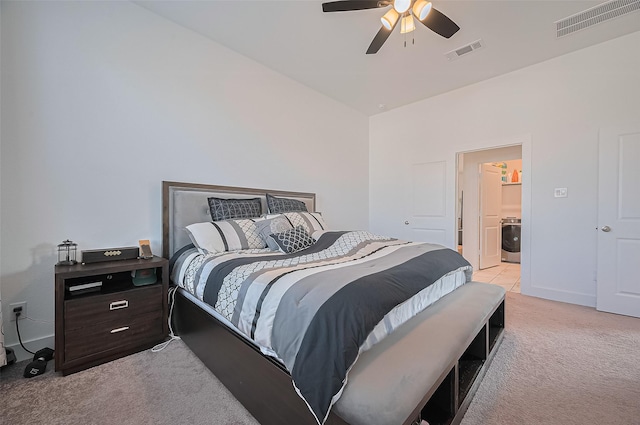 4507 Mustang Run Dr, Rosenberg, TX 77469 - bedroom featuring light carpet, ceiling fan, washer / dryer, and baseboards