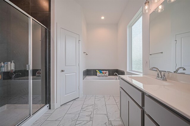 4507 Mustang Run Dr, Rosenberg, TX 77469 - full bath featuring vanity, marble look tiles, a bath, a shower stall, and recessed lighting