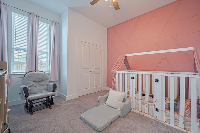 4507 Mustang Run Dr, Rosenberg, TX 77469 - carpeted bedroom with multiple windows, a crib, and ceiling fan