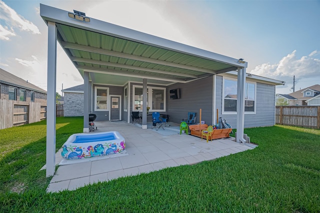 4507 Mustang Run Dr, Rosenberg, TX 77469 - rear view of property with a patio area